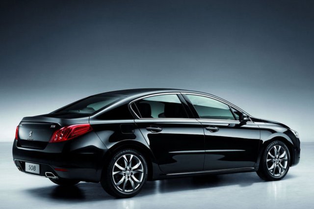 black-peugeot-sedan